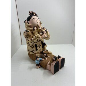 Clay Storyteller Figurine With Multicolored Children & Flute Design